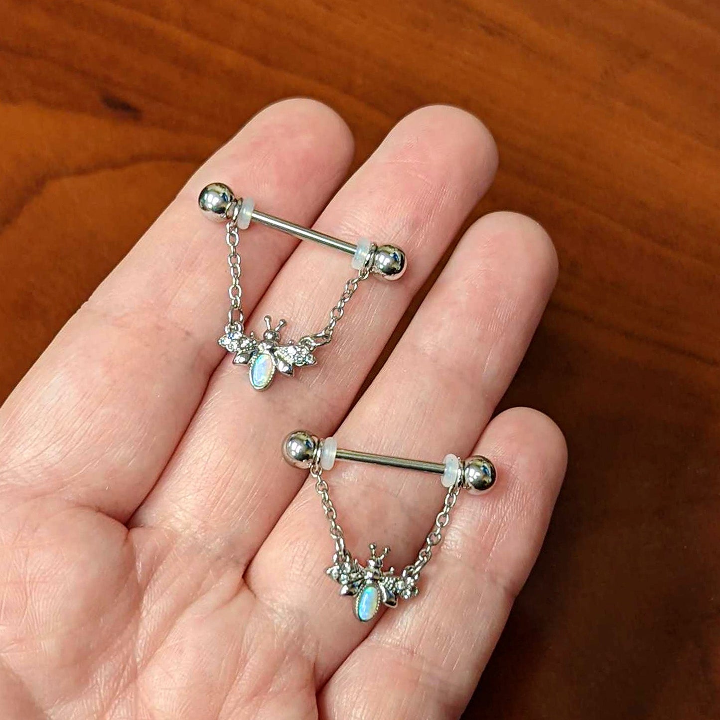 14 Gauge 9/16 White Synthetic Opal Chain Dangle Nipple Ring Set