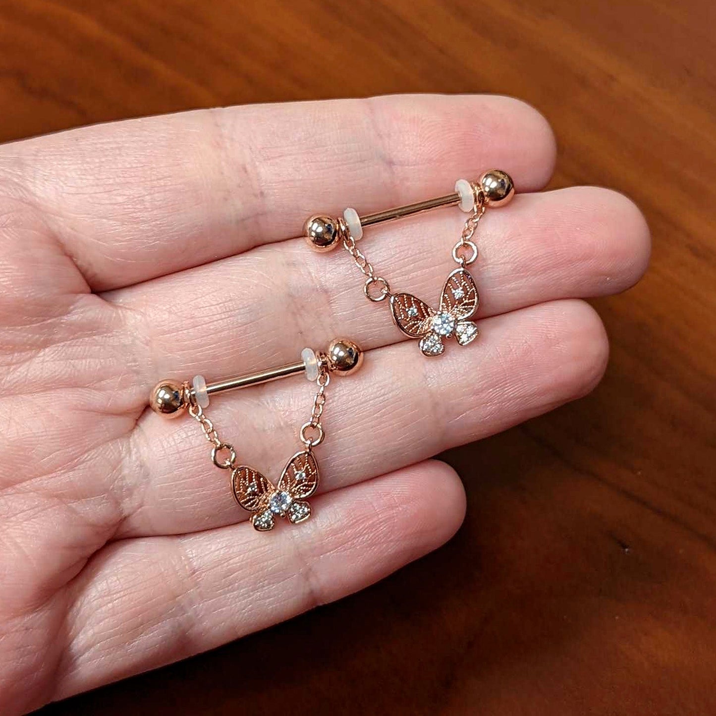 14 Gauge 5/8 Clear Gem Rosy Tone Airy Butterfly Dangle Nipple Ring Set