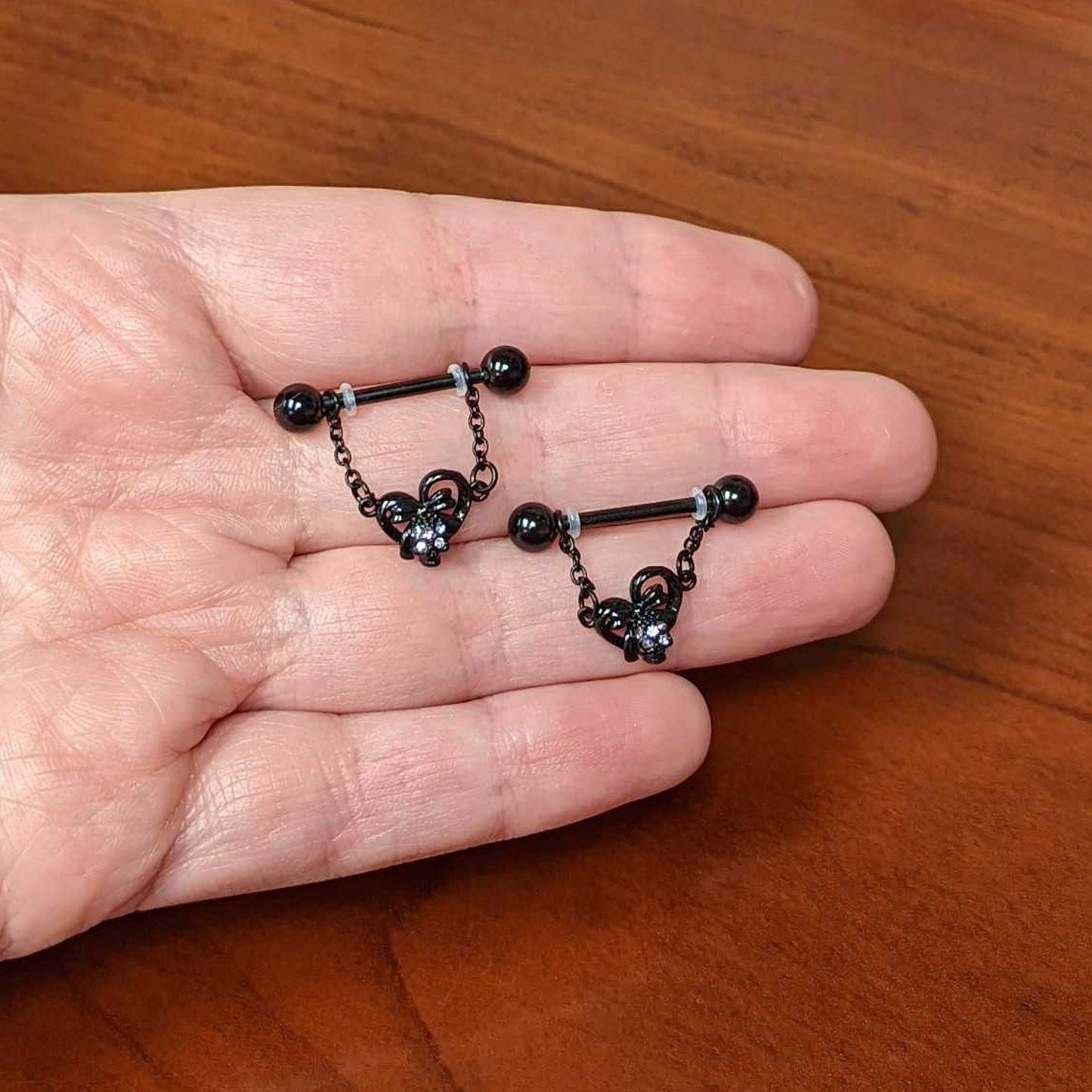 14 Gauge 9/16 Clear Gem Black Skull Bow Heart Dangle Nipple Ring Set