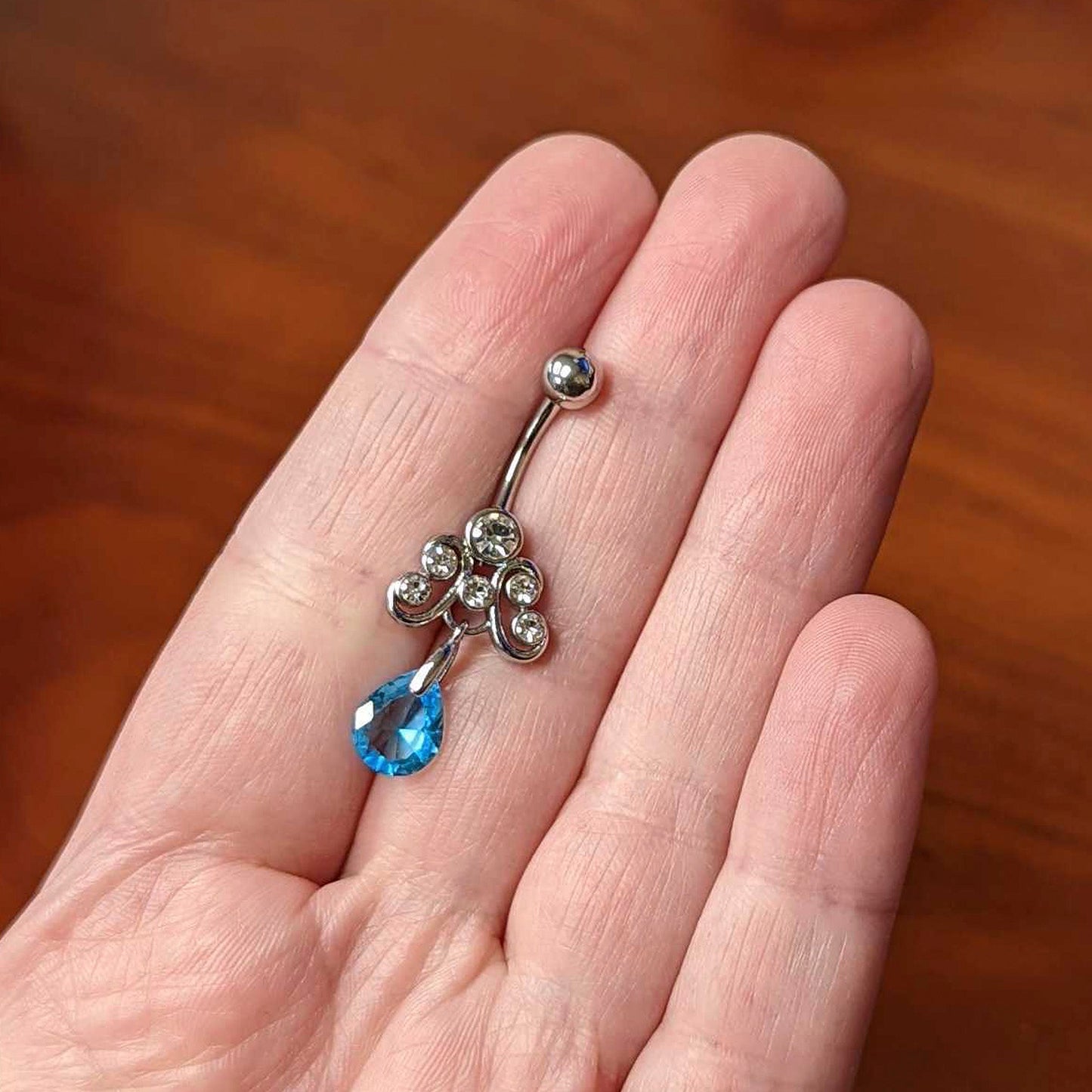 Clear Blue Gem Scrolling Elegance Dangle Belly Ring