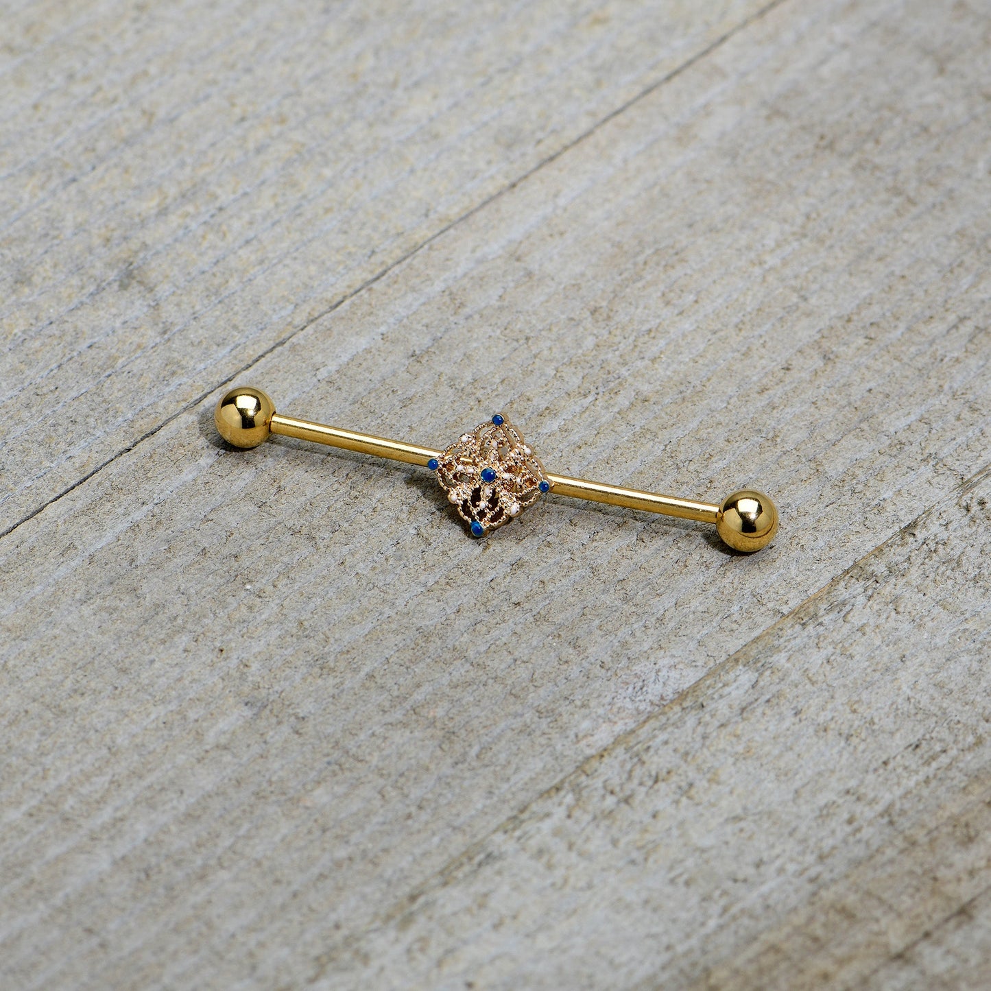 14 Gauge Blue Gem Gold Tone Texture Emblem Industrial Barbell 38mm