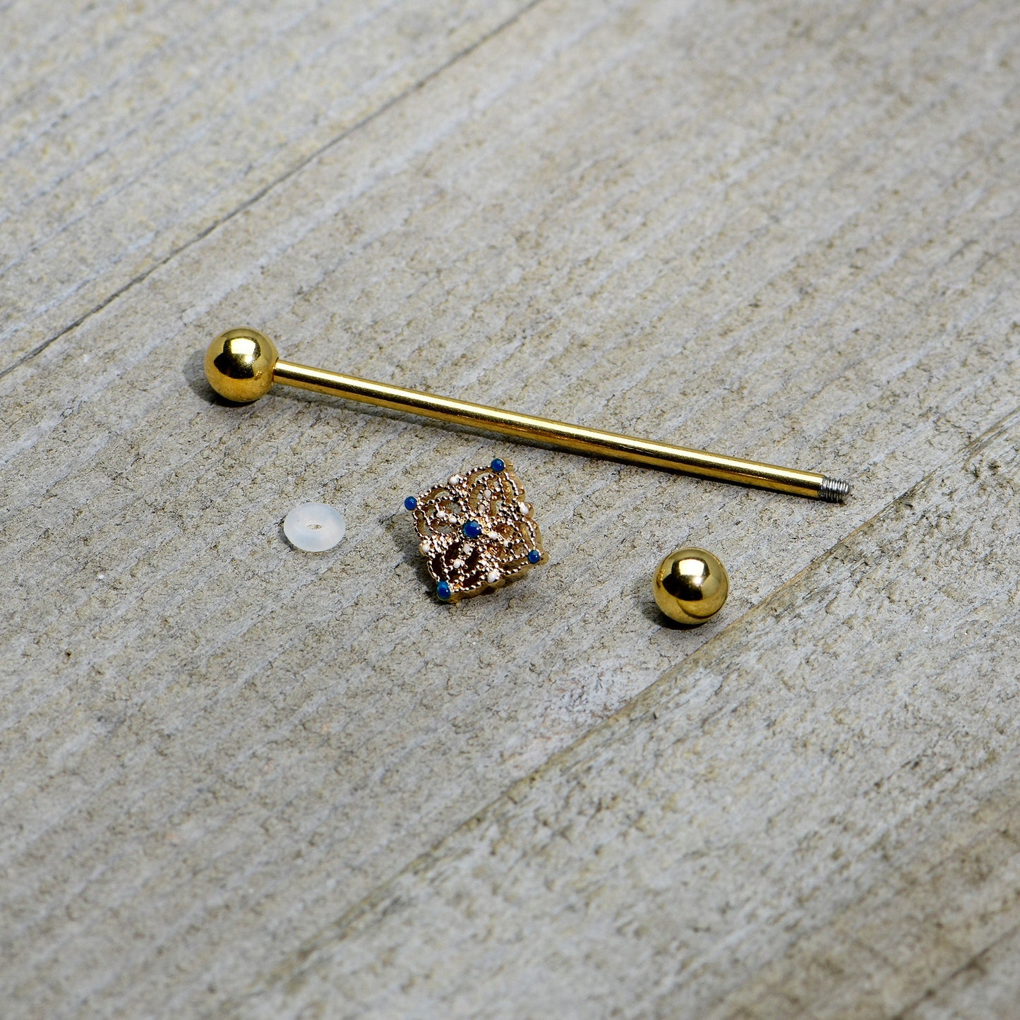 14 Gauge Blue Gem Gold Tone Texture Emblem Industrial Barbell 38mm